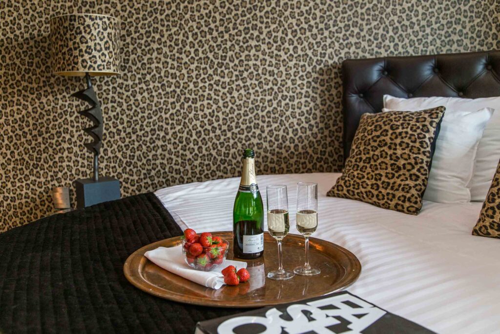 Champagne with strawberries in Boutique Romantik hotel room at Varbergs Stadshotell